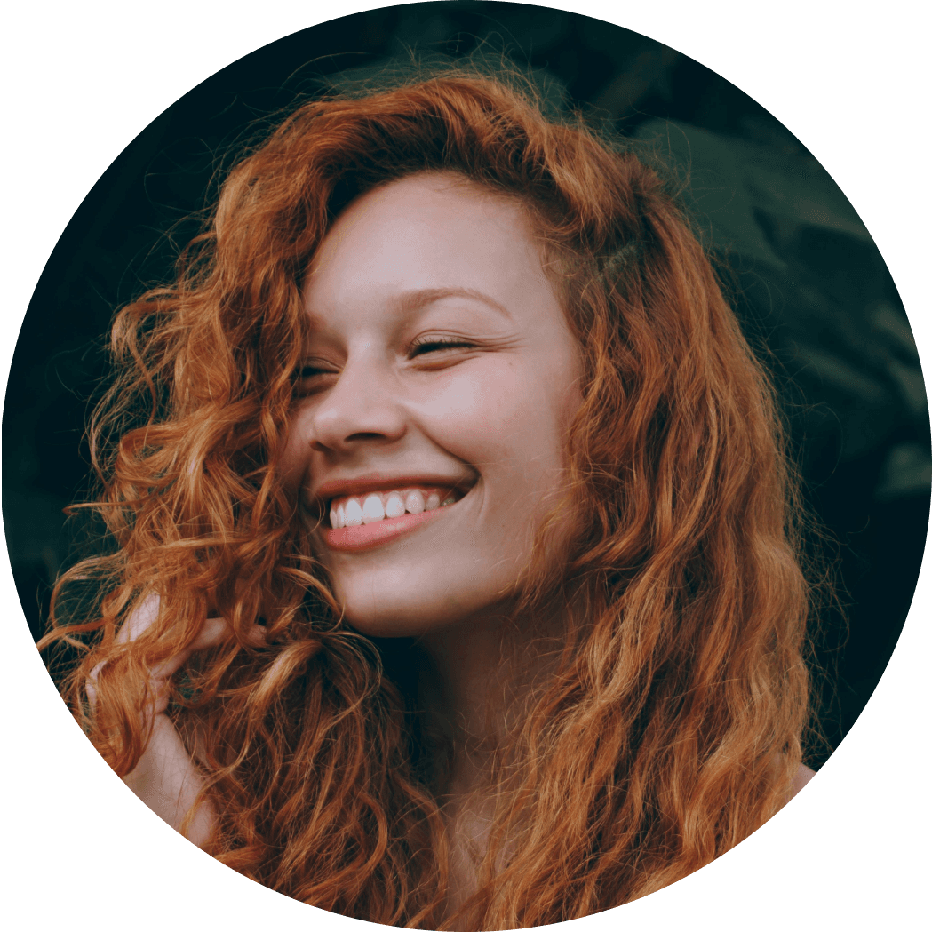 Smiling woman with curly hair